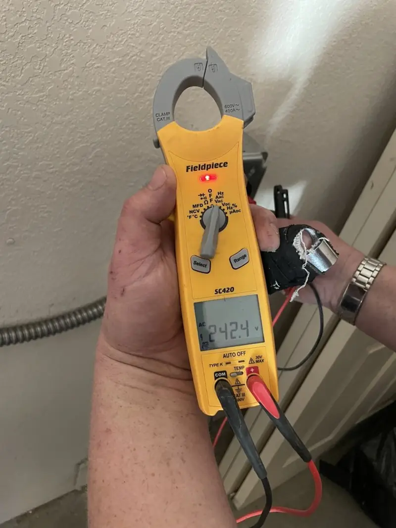Voltage testing with clamp meter during Circuit Breaker Repair in Lincoln Heights